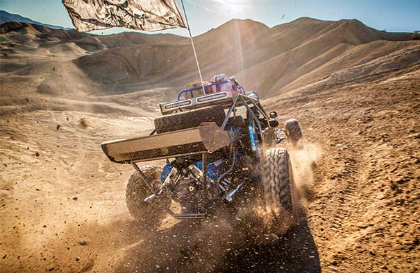 dune buggy traveling through desert